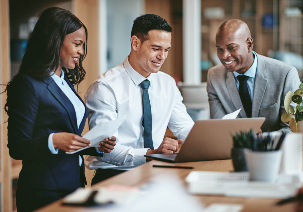 Employees looking at a computer